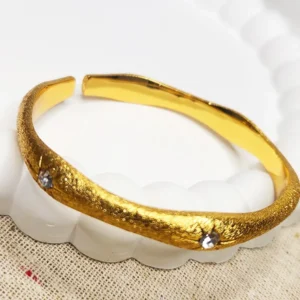 Alternative view of Stone studded gold-plated swirly bangles